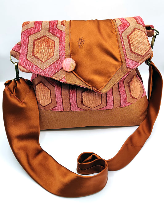 Handmade Messenger Bag (9" x 12"), featuring retro hexagon print fabric, vintage Bronzini tie strap