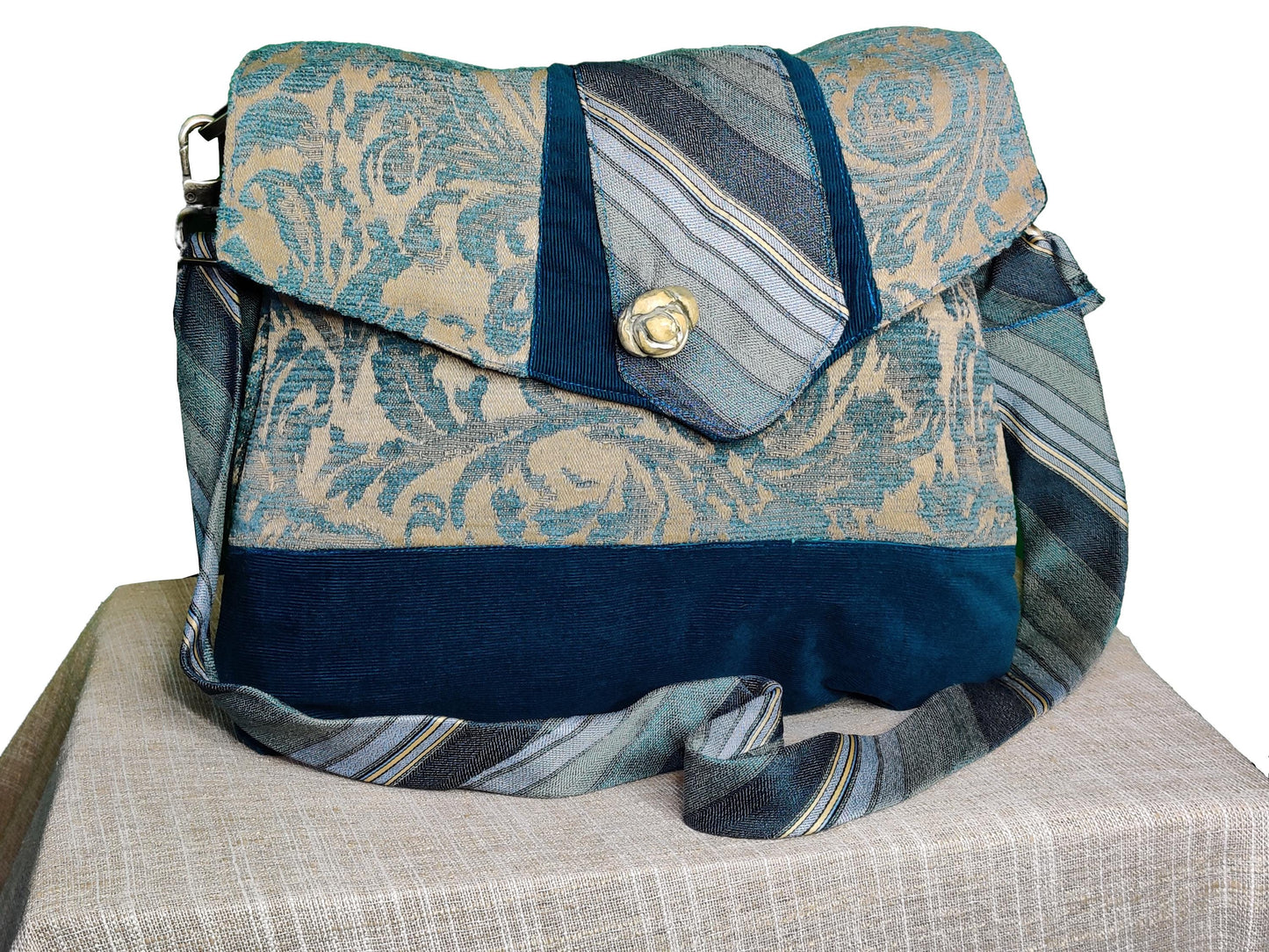 Handmade Messenger Bag (9" x 12"), featuring blue floral design with vintage tie strap