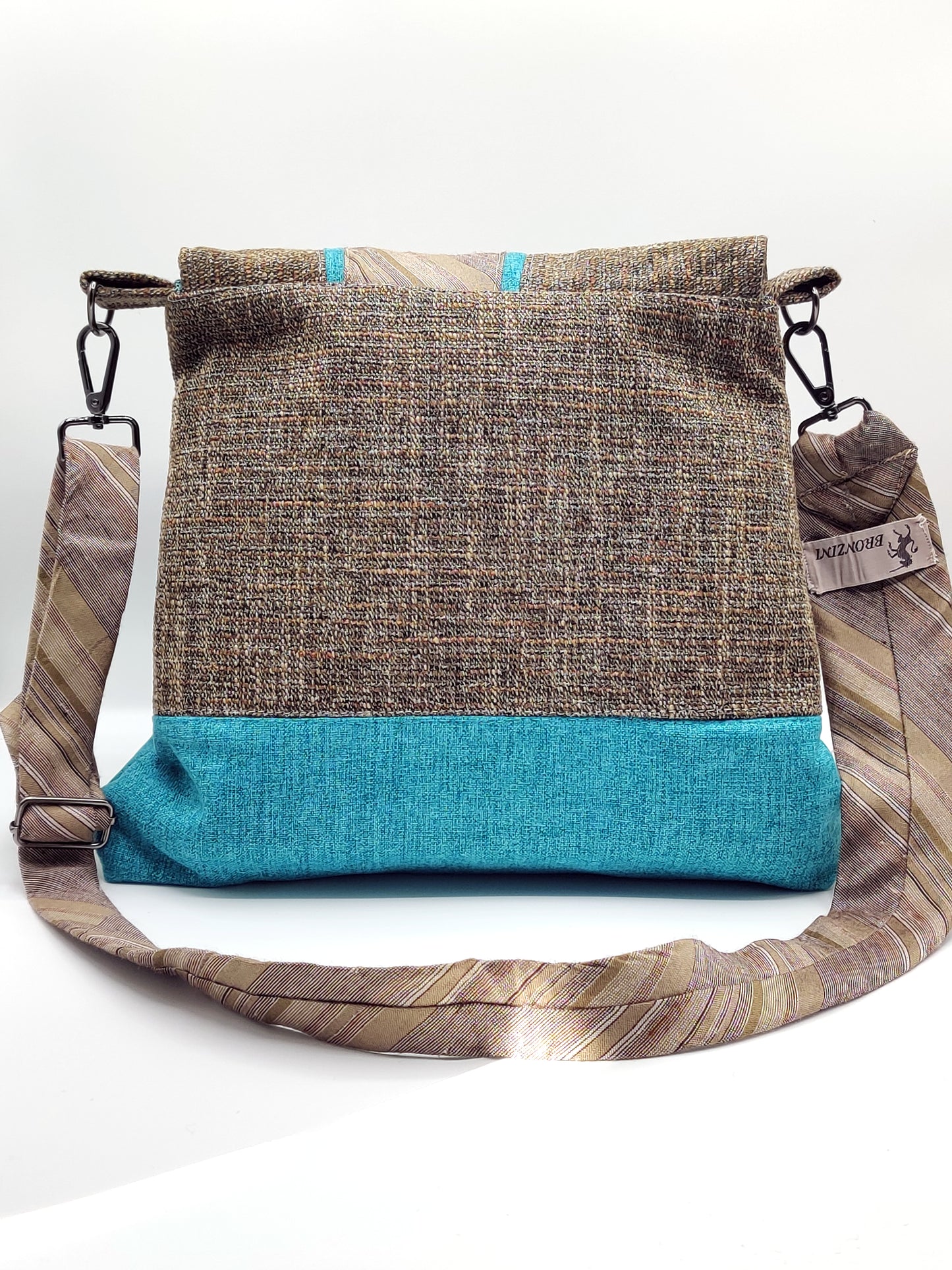 Handmade Messenger Bag (9" x 12"), featuring beige tweed and turquoise fabric, vintage Bronzini tie strap