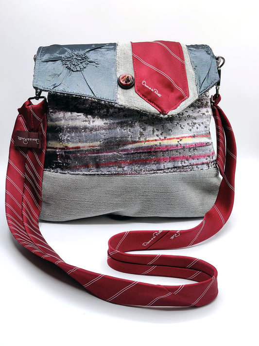 Handmade Messenger Bag (9" x 12"), featuring silver, maroon, and purple Jovian striped print fabric, vintage Oscar de la Renta Tie strap