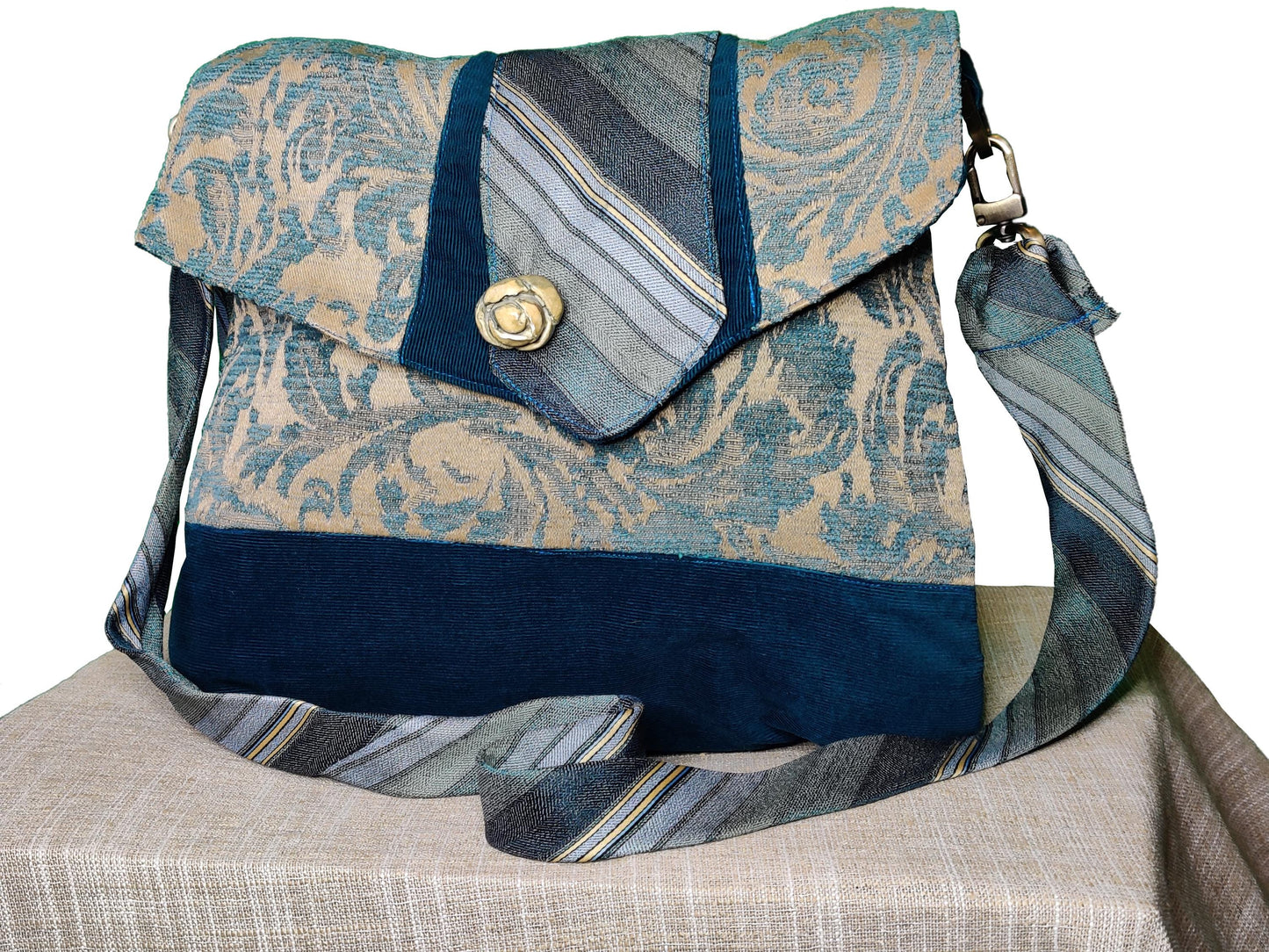 Handmade Messenger Bag (9" x 12"), featuring blue floral design with vintage tie strap